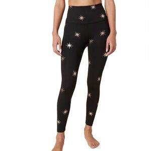 Beyond Yoga Black Leggings with Gold Star Pattern